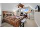 Bedroom with a tropical styled bed and ceiling fan at 5027 Prato Loop, Myrtle Beach, SC 29579