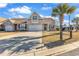 Exterior view of a well-manicured home with a two car garage and inviting curb appeal at 5027 Prato Loop, Myrtle Beach, SC 29579