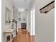 Inviting hallway with hardwood floors leads to other rooms in the house at 5027 Prato Loop, Myrtle Beach, SC 29579