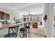 Open concept kitchen with granite countertops and dark wood cabinets at 5027 Prato Loop, Myrtle Beach, SC 29579