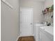 White laundry room with shelving above washer and dryer at 5027 Prato Loop, Myrtle Beach, SC 29579