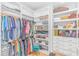 Organized walk-in closet featuring shelving, hanging racks, drawers, and ample storage space at 518 Harbour View Dr., Myrtle Beach, SC 29579