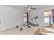 Bedroom features neutral carpet, ceiling fan and natural light throughout at 560 Pier Ct., Longs, SC 29568