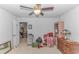 Bright bedroom featuring neutral flooring, a small workspace and bright white walls at 560 Pier Ct., Longs, SC 29568