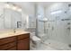 Bathroom features a glass enclosed shower, toilet, sink with vanity and accent tiles at 587 Starlit Way, Myrtle Beach, SC 29579