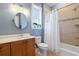 Well-lit bathroom with vanity, shower and tub combination with shower curtain at 587 Starlit Way, Myrtle Beach, SC 29579