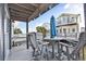 View of a deck with a table and seats at 6001-0917 S Ocean Blvd., Myrtle Beach, SC 29575