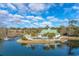 Aerial view of a community building on an island in a pond with fountain at 601 Hillside Dr. N # 3736, North Myrtle Beach, SC 29582