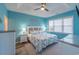 Spacious bedroom with tray ceiling, ceiling fan, and large window for natural light at 601 Hillside Dr. N # 3736, North Myrtle Beach, SC 29582