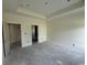 A spacious bedroom with neutral walls, base trim and multiple doorways at 6049 Hodges Rd., Conway, SC 29527