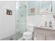 Bright white bathroom with subway tile, glass shower, and neutral color scheme at 616 36Th Ave. S, North Myrtle Beach, SC 29582