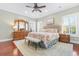 Bright main bedroom with a ceiling fan, white trim and a large rug at 704 Compass Pointe Dr, North Myrtle Beach, SC 29582