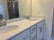 Bathroom vanity with double sinks, granite countertops, and modern fixtures at 7059 Shady Grove Rd., Conway, SC 29527
