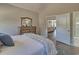 Bedroom with a view to a large wooden dresser across from the bed with an open door to the living room at 7059 Shady Grove Rd., Conway, SC 29527