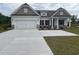 Charming single-Gathering home with a two-car garage and neutral exterior paint scheme at 7059 Shady Grove Rd., Conway, SC 29527