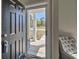 View through the front door showing front porch and outside landscape at 7059 Shady Grove Rd., Conway, SC 29527