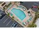 Aerial view of outdoor pool with lounge chairs, tables, and umbrellas at the Ocean View Towers at 7601 N Ocean Blvd. # 4-D, Myrtle Beach, SC 29572