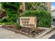 Welcome to Ocean View Towers sign surrounded by landscaping at 7601 N Ocean Blvd. # 4-D, Myrtle Beach, SC 29572