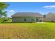 This large backyard features a patio and ample lawn space, ideal for relaxation and outdoor entertaining at 825 Payne Ct., Conway, SC 29526