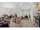Open-concept kitchen featuring stainless steel appliances, plenty of counter space, and a seamless flow to the dining area at 825 Payne Ct., Conway, SC 29526