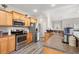 Well-equipped kitchen featuring stainless steel appliances, granite countertops, and ample cabinet space for storage at 825 Payne Ct., Conway, SC 29526