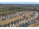 The neighborhood is surrounded by lush trees in this picturesque aerial view of the community at 8500 Dunes Point Way, Longs, SC 29568