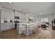 Contemporary kitchen featuring stainless steel appliances, grey cabinets, and a stylish island with seating at 8500 Dunes Point Way, Longs, SC 29568