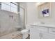 Elegant bathroom features a glass shower, white vanity, and modern mirror at 949 Crystal Water Way, Myrtle Beach, SC 29579