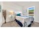 Comfortable bedroom featuring neutral walls, a side table, and plenty of natural light at 969 Oak Hollow St., Longs, SC 29568