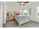 Cozy main bedroom with a comfortable bed, stylish lamps, and a serene ambiance enhanced by natural light at 969 Oak Hollow St., Longs, SC 29568