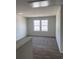 Upstairs bonus room with natural light offers a versatile living space at 990 Oak Hollow St., Longs, SC 29568