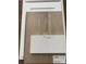 Selection of interior materials including cabinet door, flooring, and countertop samples at 990 Oak Hollow St., Longs, SC 29568