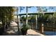 Picturesque river walk featuring a wooden boardwalk along the river's edge with lush greenery and a bridge at 990 Oak Hollow St., Longs, SC 29568