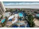 An aerial view shows a beautiful resort pool area alongside a sandy beach at 100 North Beach Blvd. # 1917, North Myrtle Beach, SC 29582