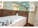 Clean white bath tub with silver hardware, tile surround, and light-colored walls at 100 North Beach Blvd. # 1917, North Myrtle Beach, SC 29582