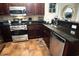 Kitchen area featuring stainless steel appliances, granite countertops, and a tile floor at 100 North Beach Blvd. # 1917, North Myrtle Beach, SC 29582