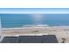 A sunny view of the beach and waves at 1000 N Waccamaw Dr. # 205, Murrells Inlet, SC 29576