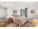 Cozy bedroom featuring a queen bed, neutral walls, and wood-look floors at 1000 N Waccamaw Dr. # 205, Murrells Inlet, SC 29576