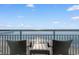 Enjoy breathtaking ocean views from this charming balcony with comfortable seating at 107 S Ocean Blvd. # 1002, Myrtle Beach, SC 29577