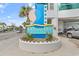 Prominent sign displays the resort name, Oceans One Resort, with beachy colors and font at 107 S Ocean Blvd. # 1002, Myrtle Beach, SC 29577