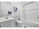 Clean bathroom featuring a shower-tub combo with a large mirror and ample counter space at 1201 Trisail Ln, North Myrtle Beach, SC 29582