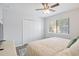 Cozy bedroom with a neutral color scheme, featuring a ceiling fan and ample natural light at 128 Beaver Pond Loop # 48, Pawleys Island, SC 29585