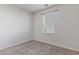 The cozy bedroom features neutral carpeting, a window and a clean, soothing ambience at 135 Harmony Ln., Myrtle Beach, SC 29588