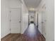 A bright hallway with wood-look floors leads to the front door at 135 Harmony Ln., Myrtle Beach, SC 29588