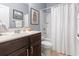 Cozy bathroom with a single sink vanity and shower with tub at 135 Parmelee Dr. # A, Murrells Inlet, SC 29576