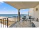 Condo balcony with ocean view and outdoor seating at 1425 S Ocean Blvd. # 8-B, North Myrtle Beach, SC 29582