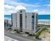 Oceanfront condo building featuring a central location and beach access at 1425 S Ocean Blvd. # 8-B, North Myrtle Beach, SC 29582