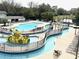 Aerial view of a resort-style pool with a ' water park at 14290 Ocean Highway # 207, Pawleys Island, SC 29585