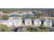 Beautiful aerial of the condo buildings and a nearby pond at 178 Clubhouse Dr. # 3, Sunset Beach, NC 28468