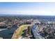 Overhead view showing the property's proximity to golf course, water and neighborhood at 178 Clubhouse Dr. # 3, Sunset Beach, NC 28468